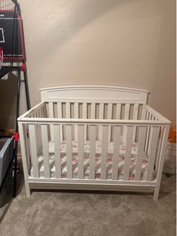 White wooden crib