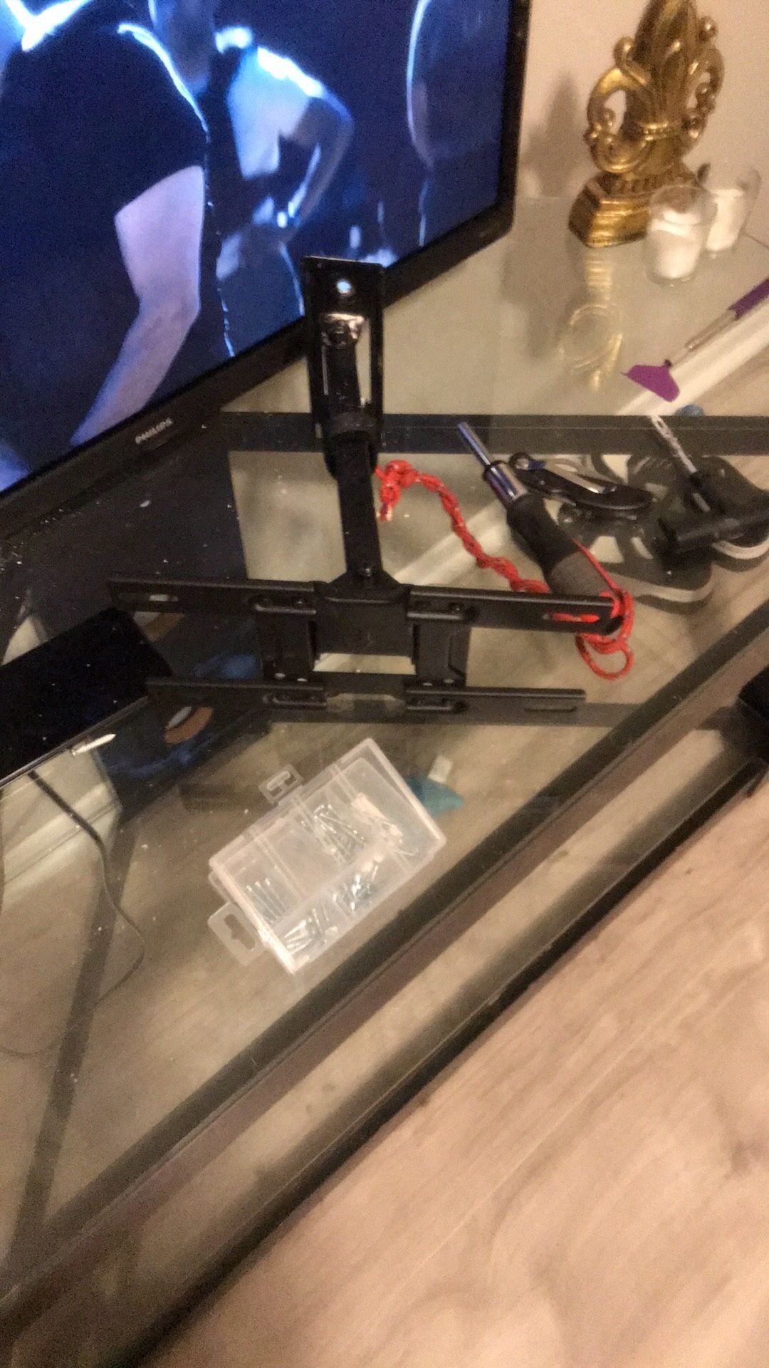 Tv Mount, 32 Inch Roku Phillips Smart Tv, Glass Tv Stand, Dancing Ceiling Lights.