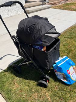 Dog stroller and puppy pads