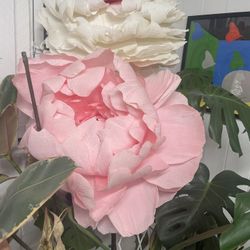 Two tall paper flowers 