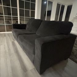 Charcoal gray sofa, 7 feet long