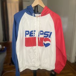 It’s a Coca-Cola windbreaker