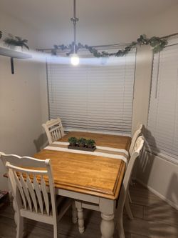 Dinning room table and chairs real wood