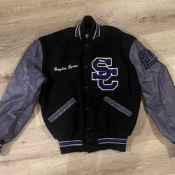 black and purple varsity jacket