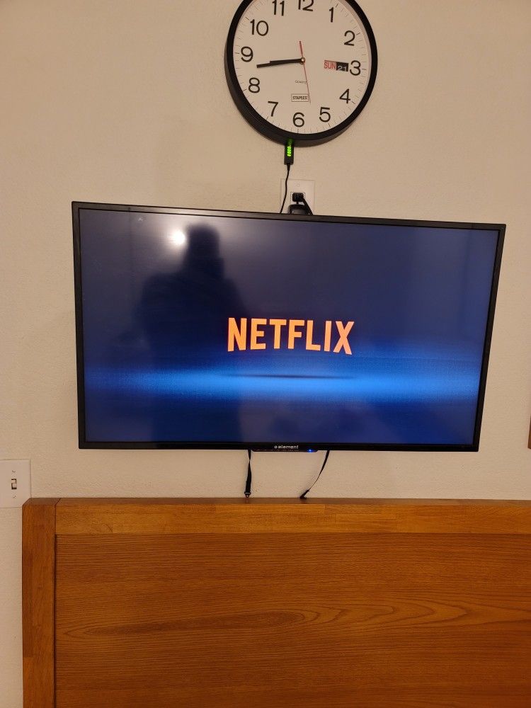 Three TVs, two 42 inches and one 58 inches, all smart and in excellent condition with remotes.