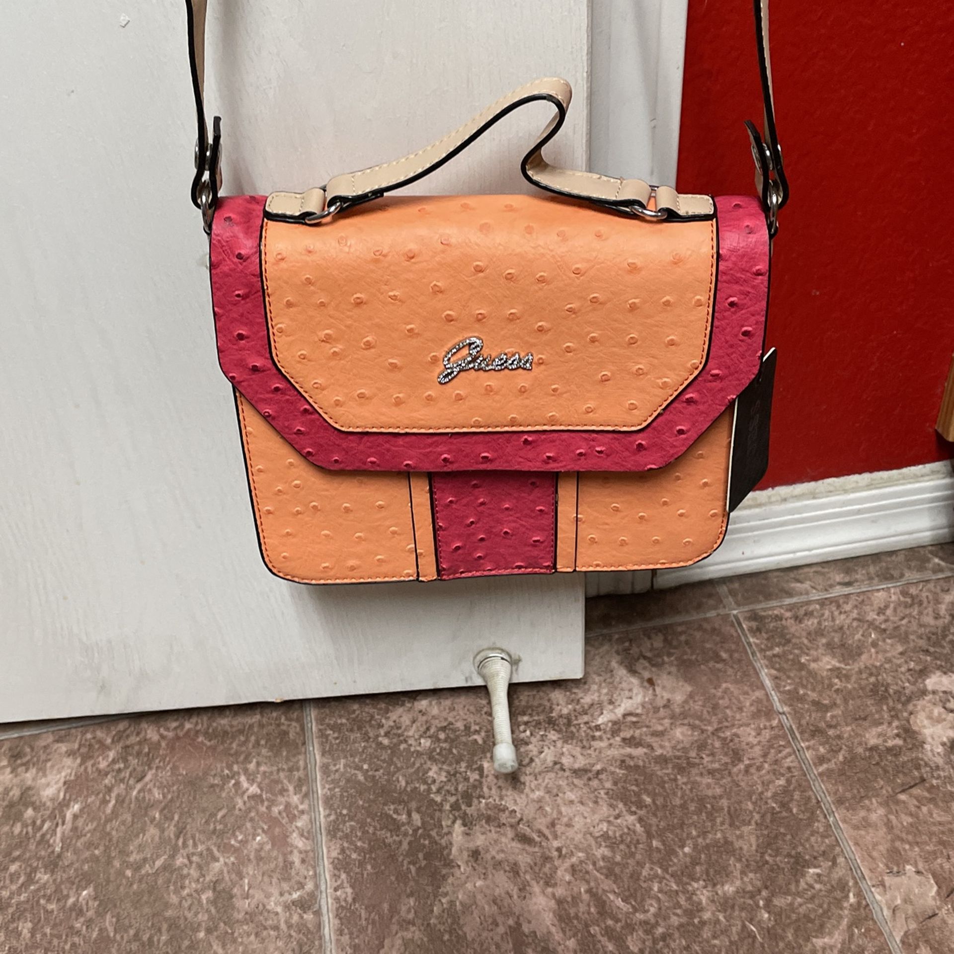Guess Sling Bag(girl)..