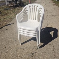 The price is firm.. four white heavy resin stackable patio chairs