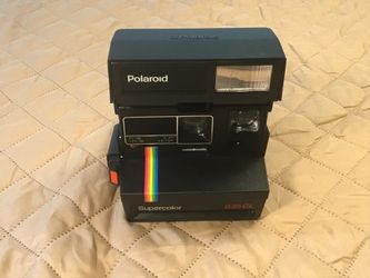 Vintage Polaroid Supercolor 635CL instant camera in excellent cosmetic condition.