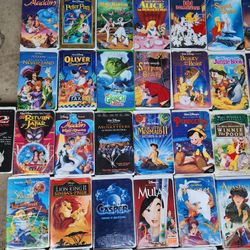 Lot of 112 VHS Tapes and DVDs