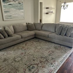 One Tan sectional sofa