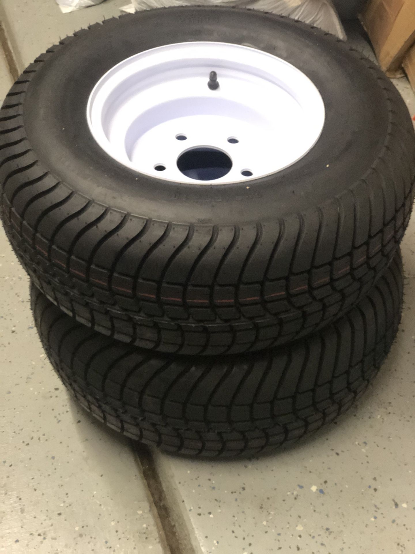 NEW- (2) Kendi Loadstar 205/65-10 Bias Trailer tires w/ 10 in Solid Center Wheel - 5 on 5.5 - LR E Retail $142 each