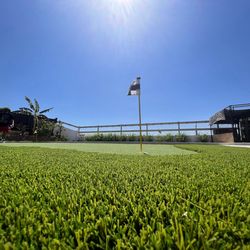 Fake grass rocks concrete