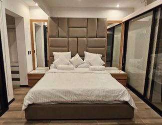 King Bed Frame with Tall Upholstered Headboard