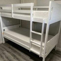 Twin over twin bunk bed. White or espresso. Assembly required. Assembly not included. Taxes included. Free delivery.  Bunk Bed only without Assembly-$