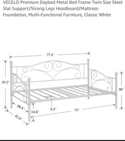White metal twin bed frame