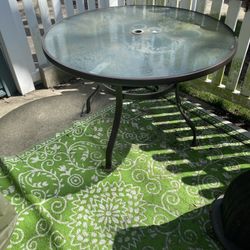 Patio Table 3- Chairs 62$.  4 Gray Chairs 30$ Rocker 55$. Battery Car 74$