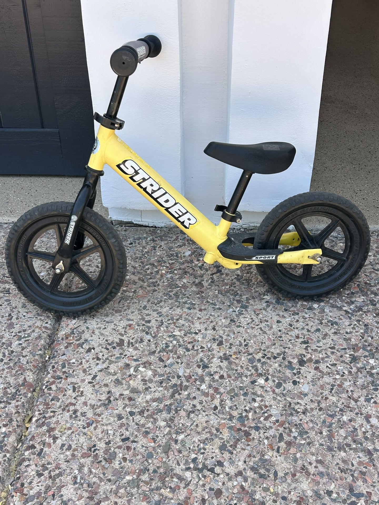 Yellow Strider Balance Bike