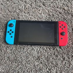 Nintendo Switch With a Case and Dock