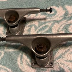 Skateboard trucks and wheels