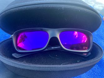Used Oakley Sunglasses with Purple lenses
