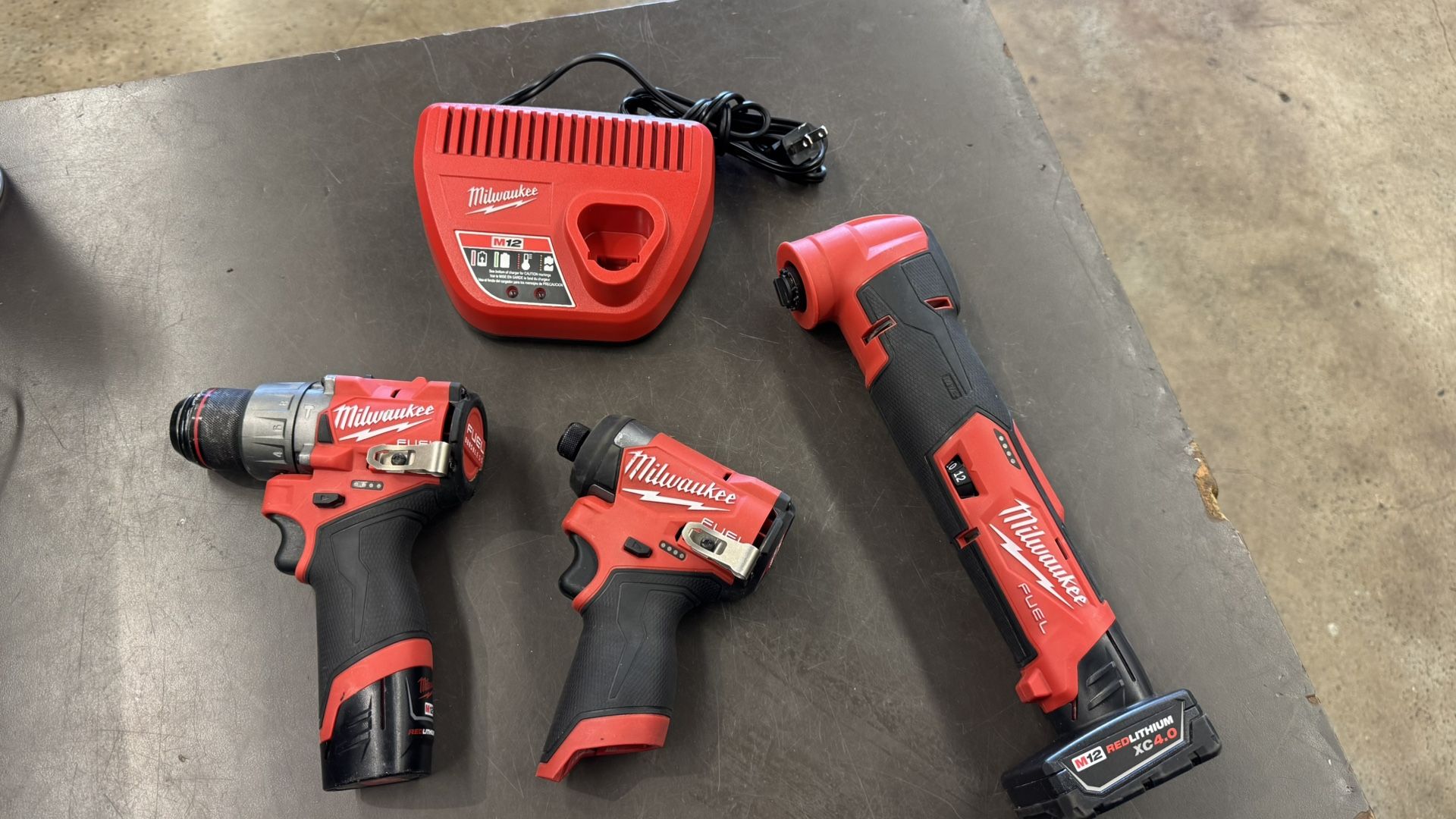 Milwaukee M12 3 pc tool set drills and multi tool w 2 batt and chrg no trades pick in Tacoma FIRM