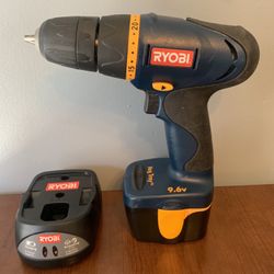 RYOBI DRILL 9.6V WITH BATTERY AND CHARGER