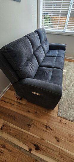 Grey/(slightly bluish) Power Reclining sofa