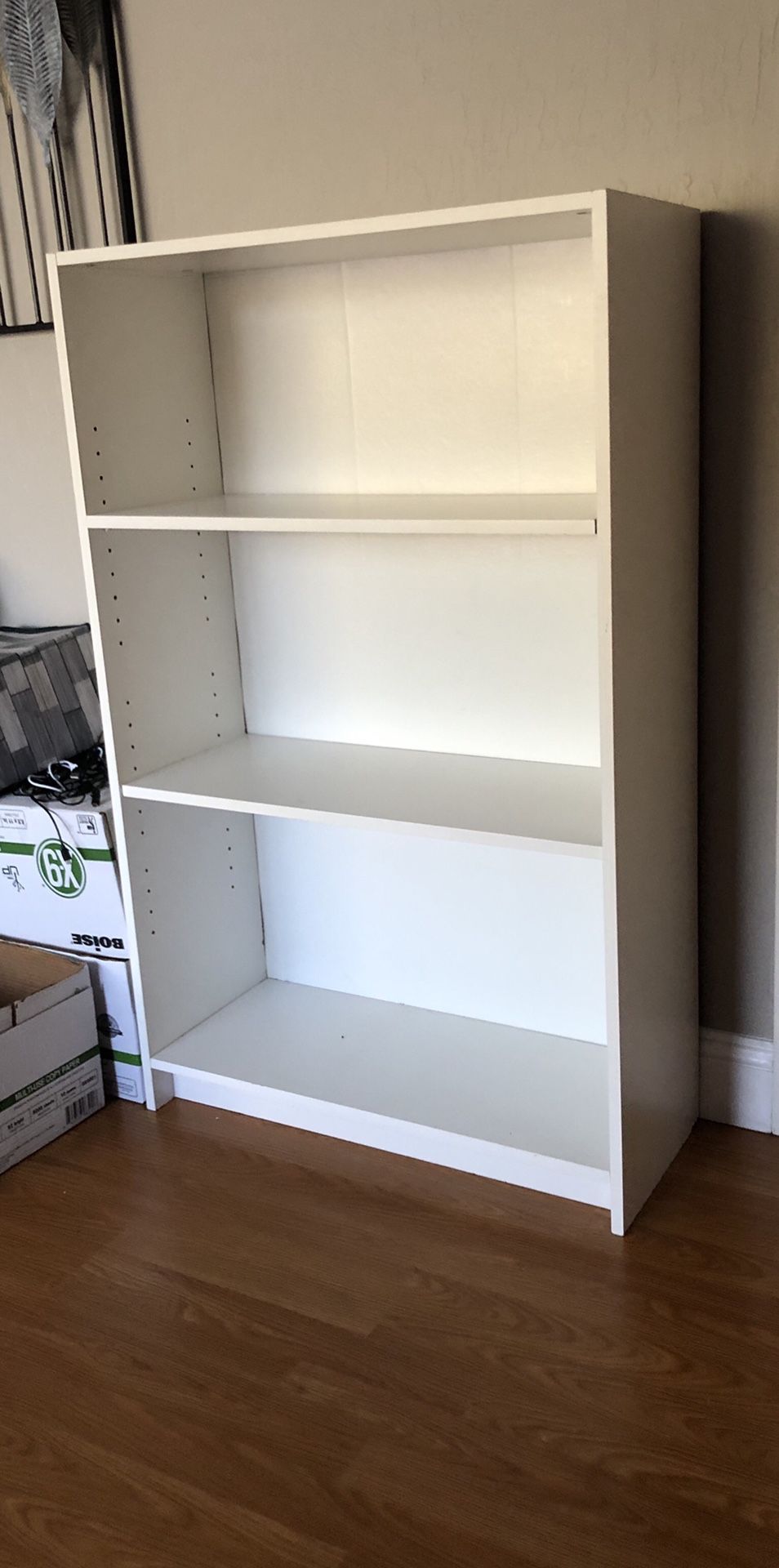 White bookcases book shelves