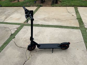 Electric scooter with charger