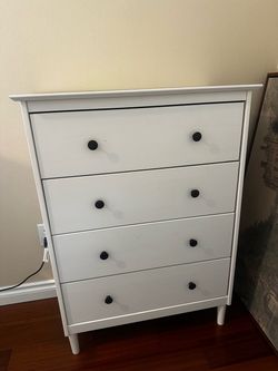 White 4-Drawer Dresser with Black Knobs