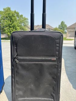 Expandable Tumi Suitcase