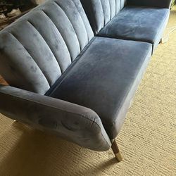 Sofa/ Futon $50 (has broken leg)