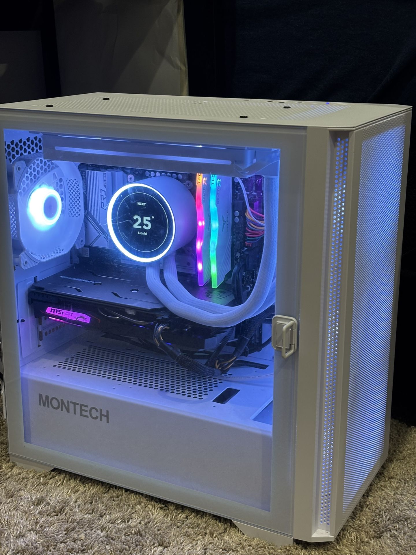 Custom built PC with gaming monitor and keyboard