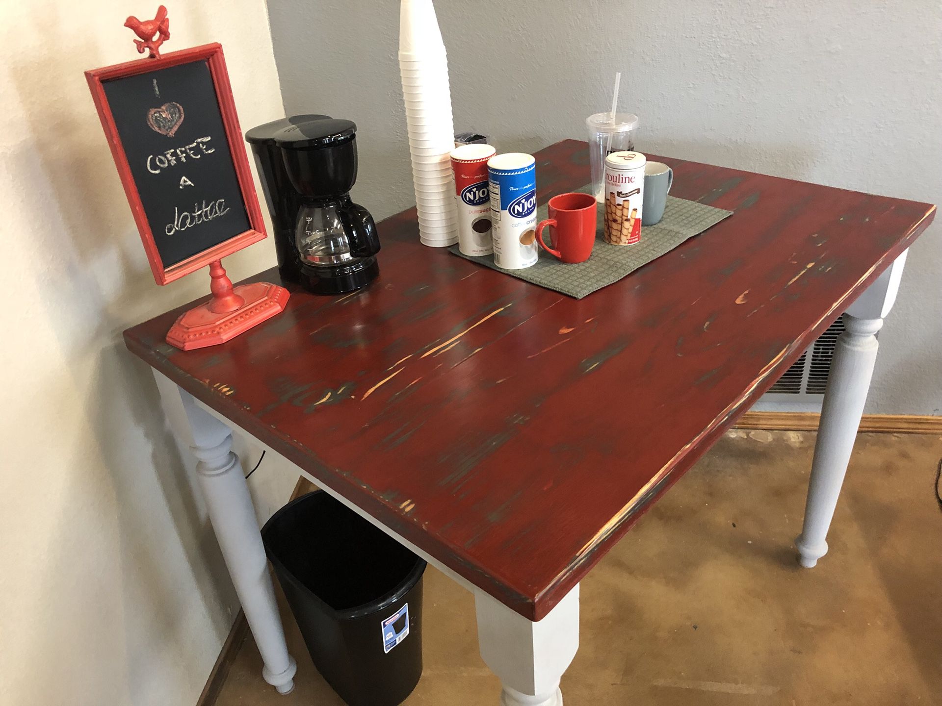 Farmhouse style weathered bar height table.