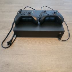 Xbox One X With Two Controllers