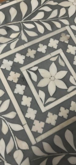 Flower, detailed bone and lay gray and ivory side table