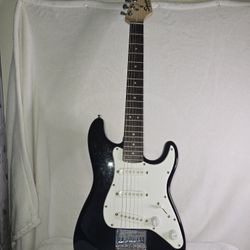 Black and White Squier Stratocaster electric guitar With Soft Cass