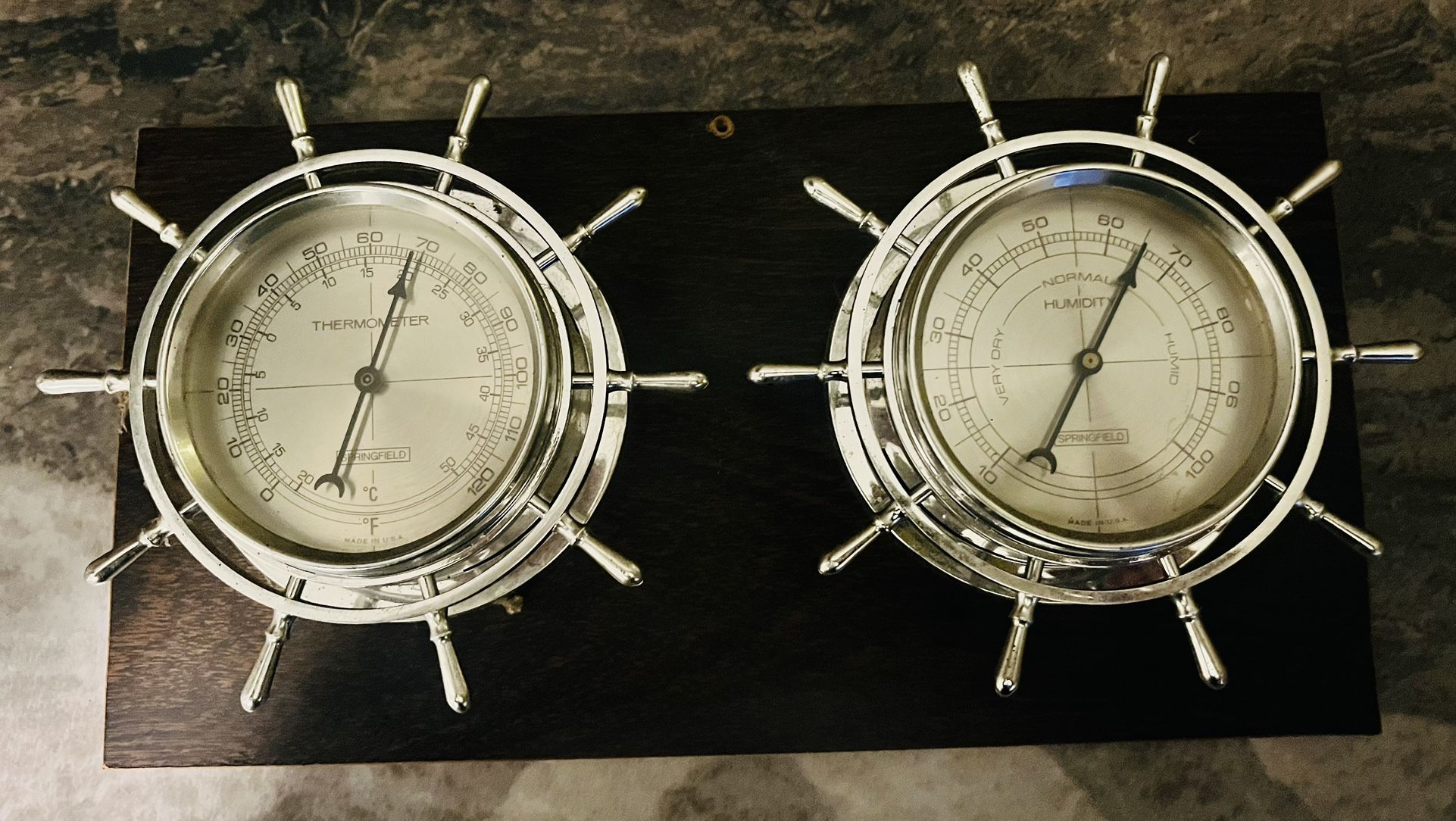 Wall-mounted, ship wheel design. Fully functional. Great home or office décor.