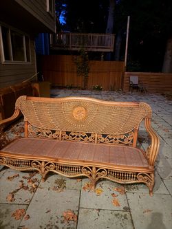 Wicker couch with cushions