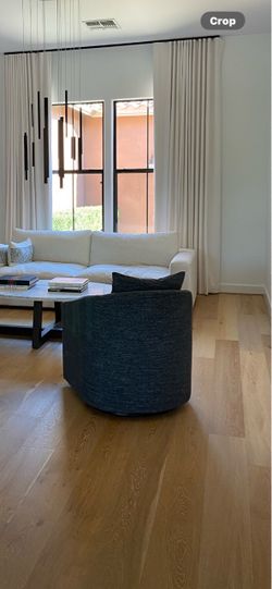 2 upholstered swivel chairs