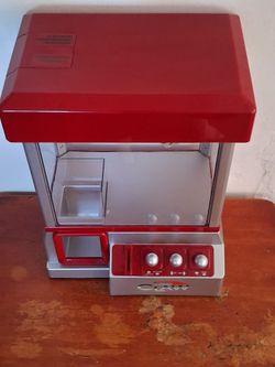 Kids  miniature claw machine...