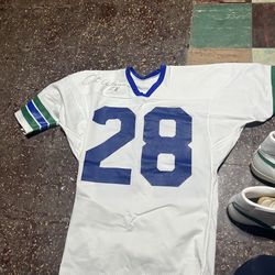 Curt Warner practice used, autographed