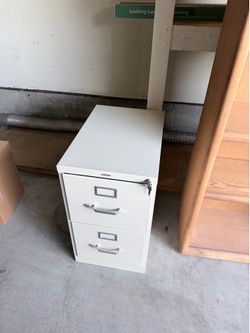 Two drawer metal file cabinet.