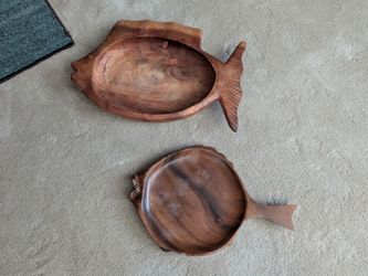 Two carved wooden fish platters, bowls, wall hanging. Ocean, nautical tiki bar decor