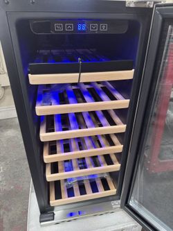 Wine Cooler Size: 14.8X33.9X22.4 Inches. Packing Size: 20.2x38x26.6 Inches. Around 33 Bottles