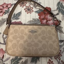 tan coach handbag
