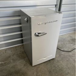Frigidaire Mini fridge And Freezer With Side Bottle Opener
