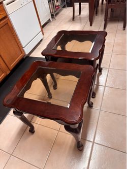 Two Used glass top end tables