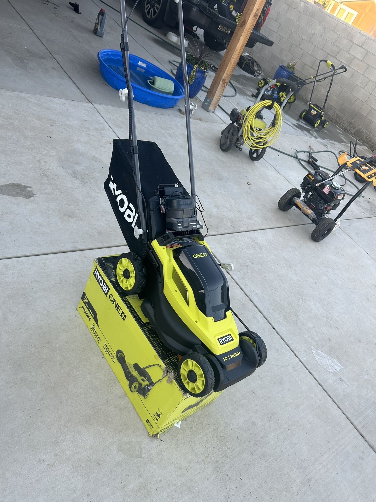 RYOBI ONE+ 18V 13 in. Cordless Battery Walk Behind Push Lawn Mower with 4.0 Ah Battery and Charger