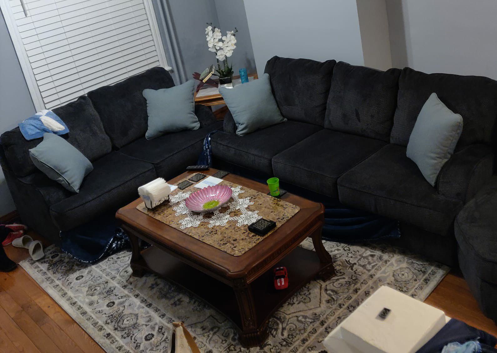 Ashley Furniture and coffee table in the middle has marble 1 year old